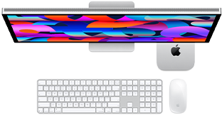 Mac mini sotto a uno Studio Display, Magic Keyboard con tastierino numerico, Magic Mouse
